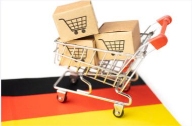 carrito con paquetes y bandera de Alemania