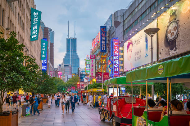 SHANGHAI - AUG 31: People at Nanjing Road on August 31, 2017. This area is the bigest shopping district in Shanghai.