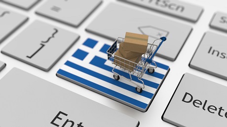 Keyboard key with flag of greece and shopping cart with boxes. online shopping related looping  animation 3D rendering
